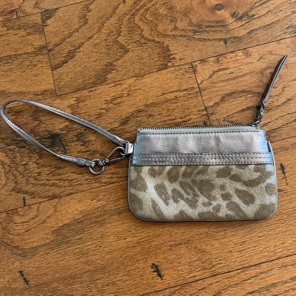 The Sak wristlet leopard and gold